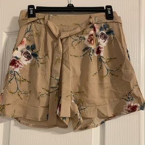 Tan flower print chiffon short with belt size M.